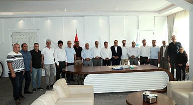 Şanlıurfa Muhtarlar Federasyonu'ndan Canpolat'a Plaket ve Teşekkür Ziyareti